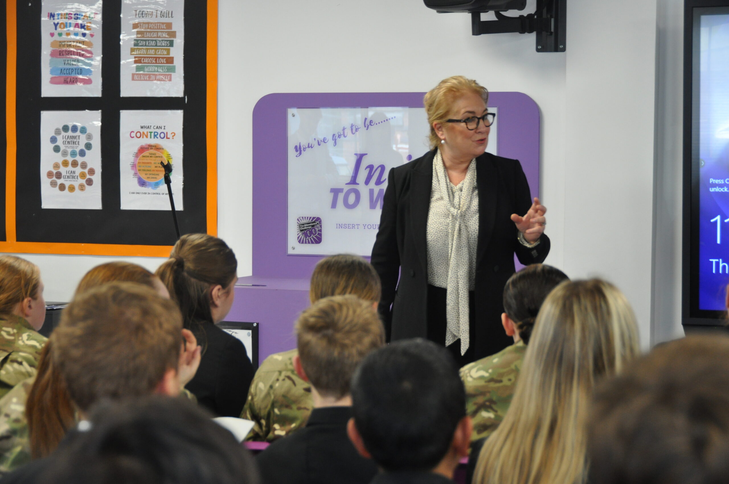 Lady Chief Justice talking to pupils in school classroom
