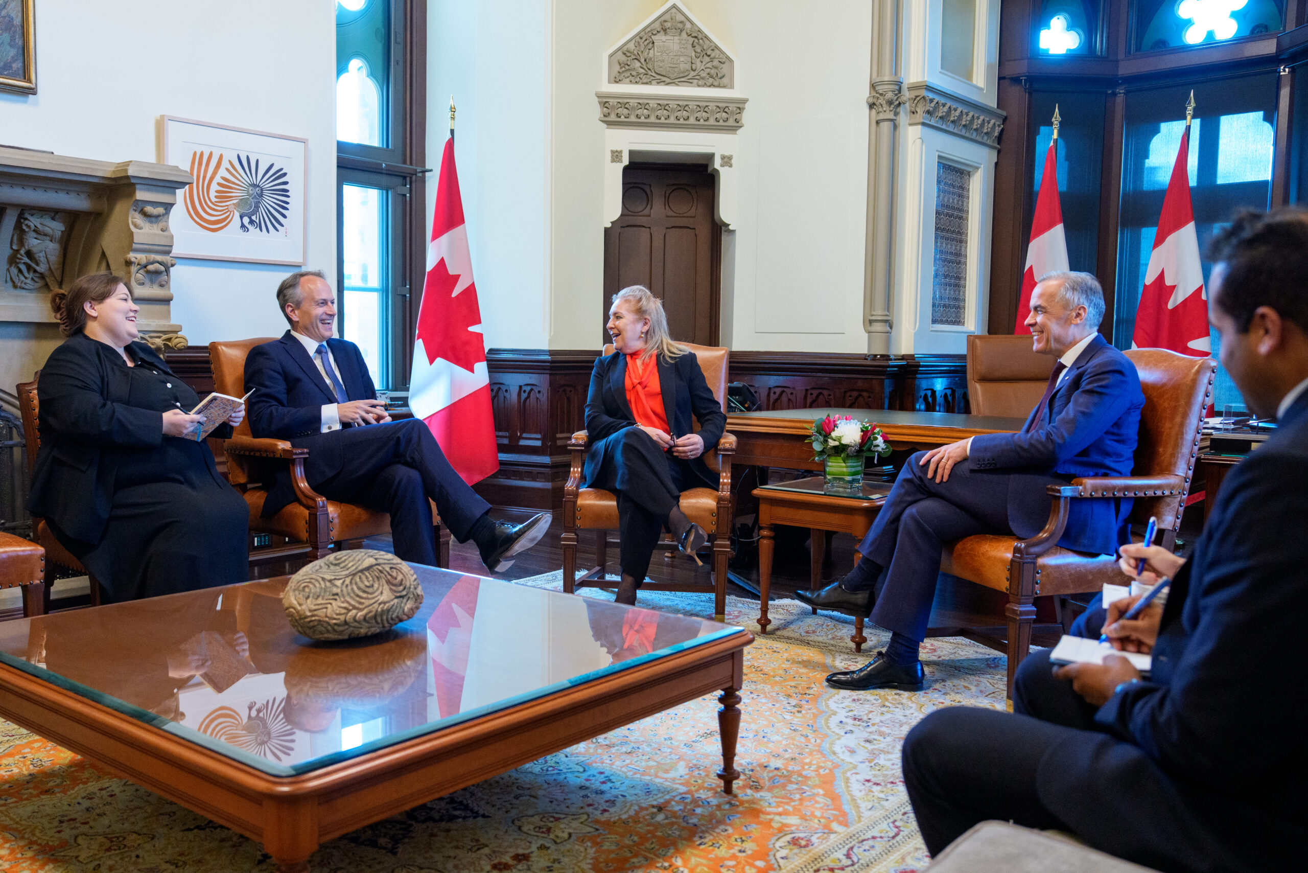 The Lady Chief Justice is seated in the Prime Minister of Canada's office addressing the room, surrounded by her Canadian counterparts.