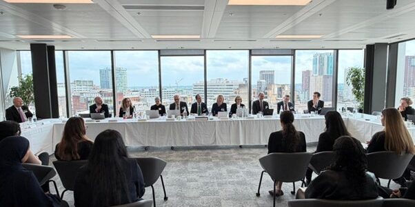 Lady Justice Sara Cockerill (Deputy Head of Civil Justice) chairing the public meeting.